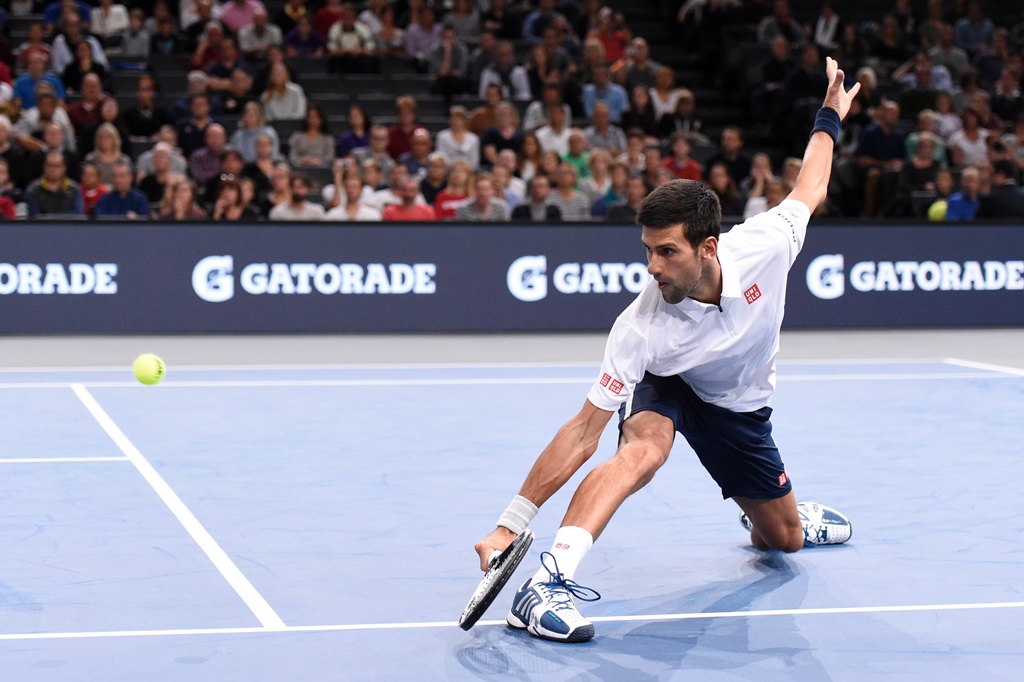 novak djokovic returns the ball in paris on october 31 2016 photo afp