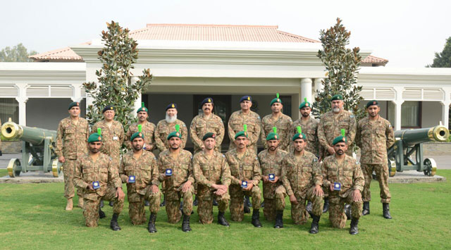 army chief general raheel sharif in a group photo with members of the pakistan army team which has recently won a gold medal at exercise cambrian patrol in wales united kingdom photo ispr