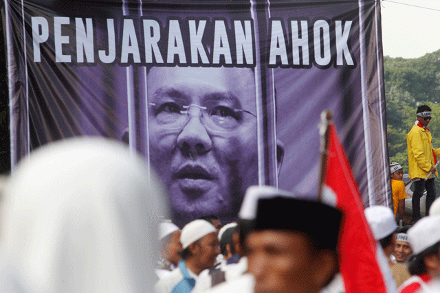 members of hardline muslim groups stand around a poster during protest against jakarta 039 s incumbent governor basuki tjahaja purnama an ethnic chinese christian running in the upcoming election in jakarta indonesia november 4 2016 poster said quot ahok should be jailed quot photo reuters members of hardline muslim groups stand around a poster during protest against jakarta 039 s incumbent governor basuki tjahaja purnama an ethnic chinese christian running in the upcoming election in jakarta indonesia november 4 2016 poster said quot ahok should be jailed quot photo reuters