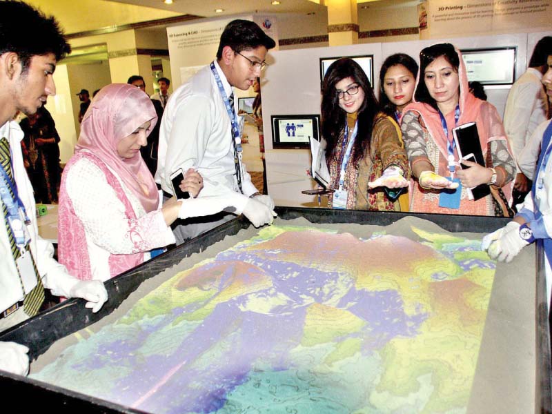 students test a project displayed by their fellows photo express students test a project displayed by their fellows photo express