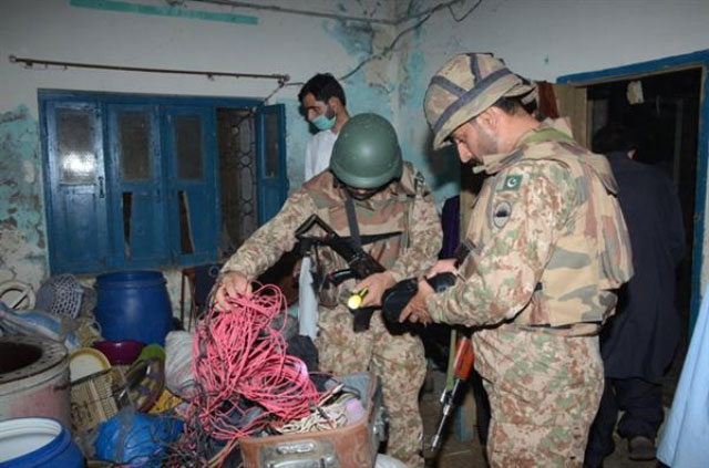 this photo shows pakistan army soldiers searching a suspected terrorist hideout during a combing operation in rawalpindi on thursday night photo ispr