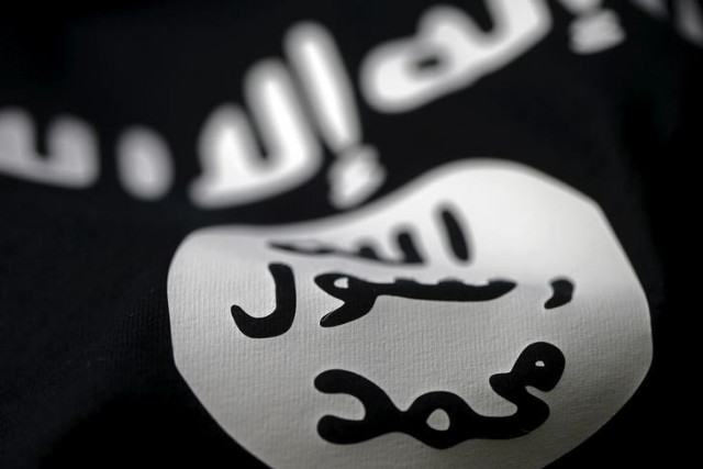an islamic state flag is seen in this picture illustration photo reuters an islamic state flag is seen in this picture illustration photo reuters