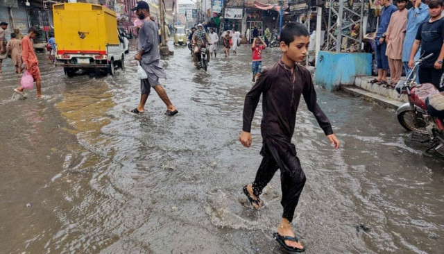 commuters face difficulties in transportation due to stagnant rainwater after heavy downpour in sukkur on saturday august 17 2024 photo ppi commuters face difficulties in transportation due to stagnant rainwater after heavy downpour in sukkur on saturday august 17 2024 photo ppi