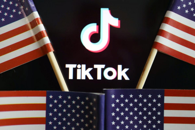us flags are seen near a tiktok logo in this illustration picture taken july 16 2020 photo reuters us flags are seen near a tiktok logo in this illustration picture taken july 16 2020 photo reuters