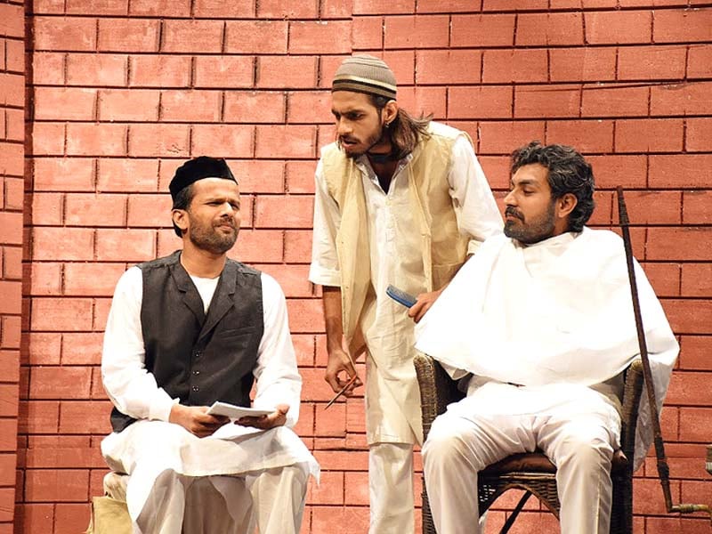 saad zameer faridi akber ladhani and zakiullah khan in a scene from the play khwabon kay musafir photos file