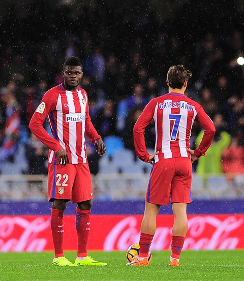 atletico madrid 039 s ghanaian midfielder thomas partey l and french forward antoine griezmann wait to kick off after real sociedad scored their second goal during the spanish league football match real sociedad vs club atletico de madrid at the anoeta stadium in san sebastian on november 6 2016 photo afp