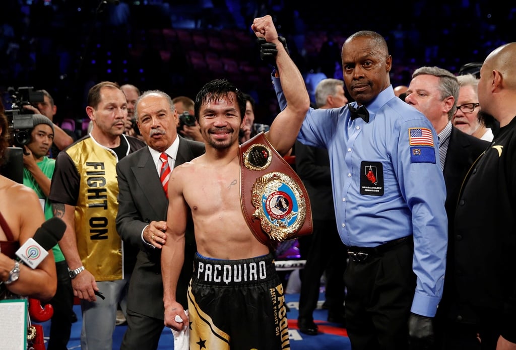 manny pacquiao celebrates his victory over wbo welterweight champion jessie vargas photo reuters las vegas sun steve marcus