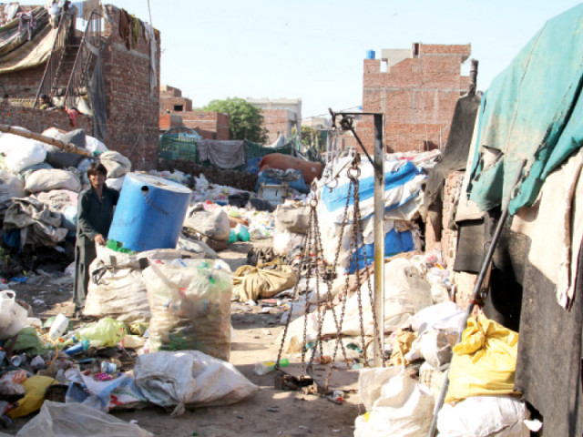 junk yards like this one at niaz beg are a regular feature of squatter settlements where garbage collectors bring the recyclable materials retrieved from the waste junk yards like this one at niaz beg are a regular feature of squatter settlements where garbage collectors bring the recyclable materials retrieved from the waste