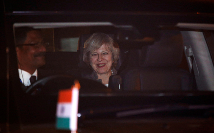 britain 039 s prime minister theresa may sits in her car after her arrival at the airport in new delhi india november 6 2016 photo reuters