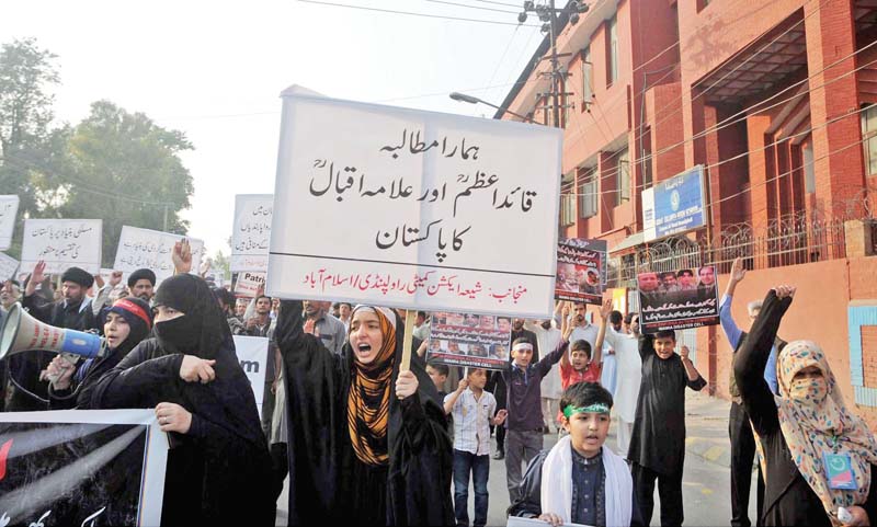 protestors march against target killing of shia community in pakistan photo ppi