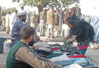 locals throng flea markets as mercury dips locals throng flea markets as mercury dips