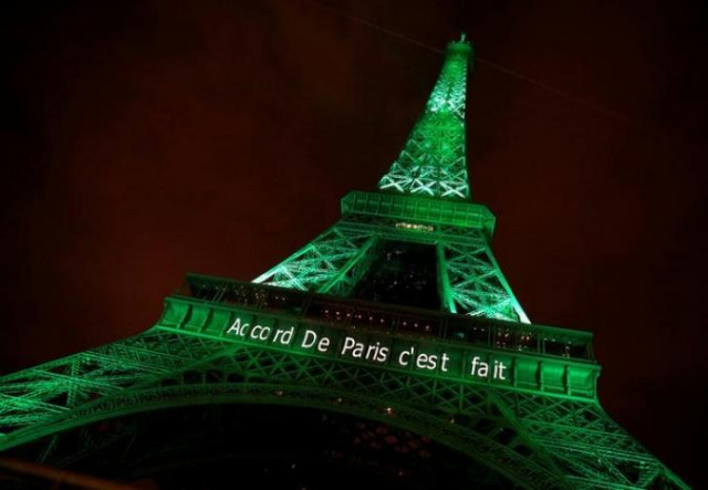 the eiffel tower is illuminated in green with the words quot paris agreement is done quot to celebrate the paris un cop21 climate change agreement in paris france photo reuters the eiffel tower is illuminated in green with the words quot paris agreement is done quot to celebrate the paris un cop21 climate change agreement in paris france photo reuters