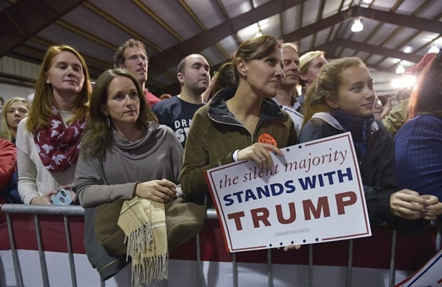supporters watch as republican presidential nominee donald trump speaks during a rally at freedom amphitheater in sterling heights michigan on november 6 2016 photo afp supporters watch as republican presidential nominee donald trump speaks during a rally at freedom amphitheater in sterling heights michigan on november 6 2016 photo afp