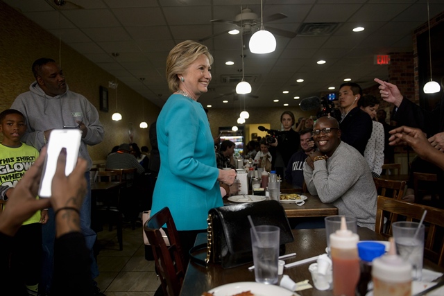 democratic presidential nominee hillary clinton visits with customers at the cedar park cafe november 6 2016 in philadelphia photo afp