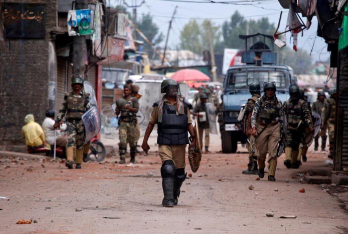 indian policemen patrol a street following a protest in srinagar photo reuters