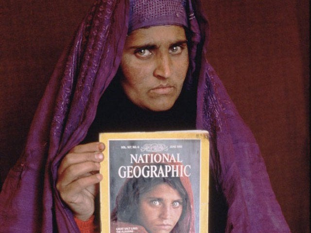 ashraf ghani will host sharbat gula on wednesday promises her a house in kabul photo express ashraf ghani will host sharbat gula on wednesday promises her a house in kabul photo express