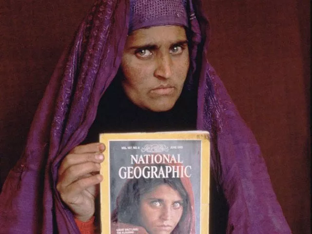 ashraf ghani will host sharbat gula on wednesday promises her a house in kabul photo express