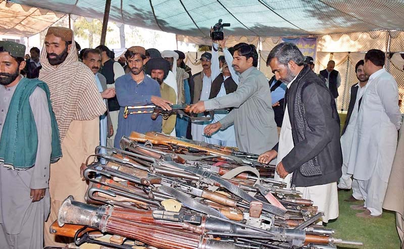 militants lay down their arms before the authorities in quetta photo online