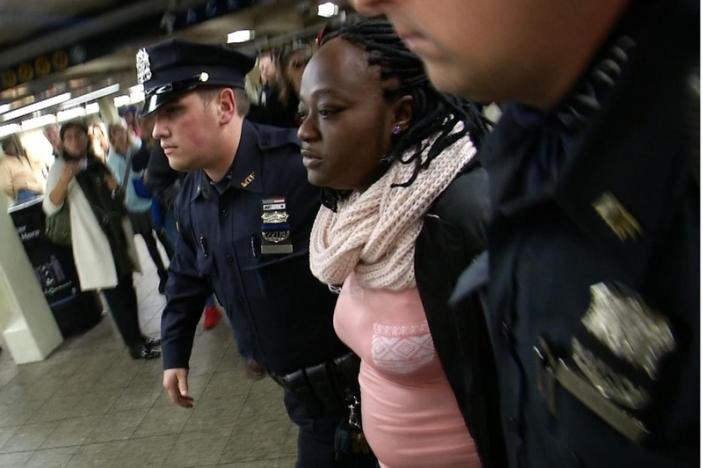 new york city police arrest a woman after a commuter was pushed in front of a subway train as it arrived at a times square train platform in new york new york photo reuters