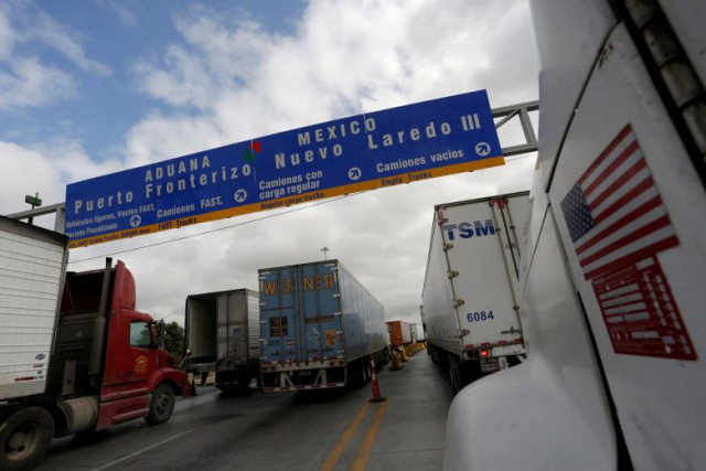 trucks wait in the queue for border customs control to cross into u s at the world trade bridge in nuevo laredo mexico november 2 2016 photo reuters trucks wait in the queue for border customs control to cross into u s at the world trade bridge in nuevo laredo mexico november 2 2016 photo reuters