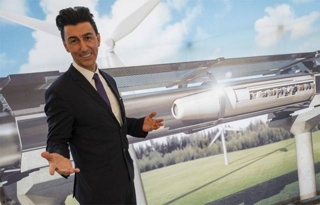 chairman of hyperloop transportation technologies inc bibop gresta poses in front of a rendering of the hyperloop technology at innotrans in berlin photo afp chairman of hyperloop transportation technologies inc bibop gresta poses in front of a rendering of the hyperloop technology at innotrans in berlin photo afp