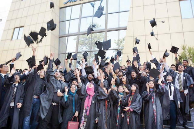 students celebrate their graduation in the traditional way by throwing their caps into the air around 61 gold medals were awarded to 43 students photo online students celebrate their graduation in the traditional way by throwing their caps into the air around 61 gold medals were awarded to 43 students photo online
