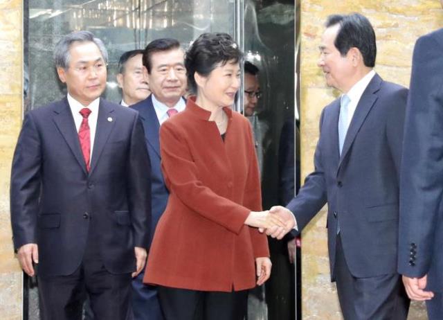 south korean president prak geun hye is greeted by parliament speaker chung sye kyun during their meeting at the national assembly in seoul south korea november 8 2016 photo reuters