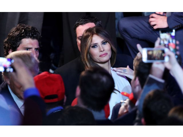 melania trump acknowledges people in the crowd after her husband and republican president elect donald trump delivered his acceptance speech at the new york hilton midtown in the early morning hours of november 9 2016 in new york city photo afp