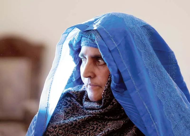 along with her son and three daughters gula crossed into afghanistan after she completed her sentence in hospital on wednesday photo reuters along with her son and three daughters gula crossed into afghanistan after she completed her sentence in hospital on wednesday photo reuters