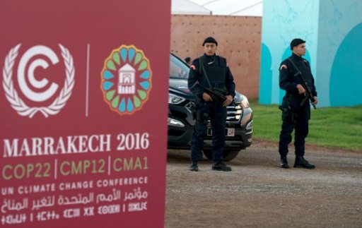 moroccan security forces stand guard during the cop22 international climate conference on november 9 2016 in marrakesh photo afp