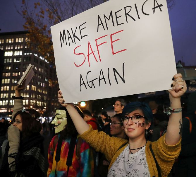 anti trump protesters gather in a park as new yorkers react to the election of donald trump as president of the united states on november 9 2016 in new york city photo afp