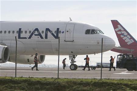 brazil 039 s tam and chile 039 s lan airlines 039 aircraft are seen parked at santiago 039 s international airport june 22 2012 photo reuters