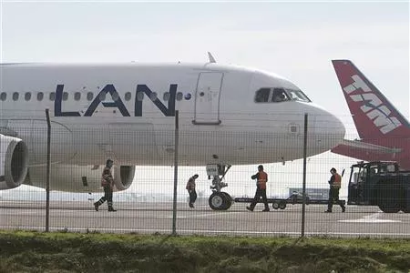 brazil 039 s tam and chile 039 s lan airlines 039 aircraft are seen parked at santiago 039 s international airport june 22 2012 photo reuters brazil 039 s tam and chile 039 s lan airlines 039 aircraft are seen parked at santiago 039 s international airport june 22 2012 photo reuters
