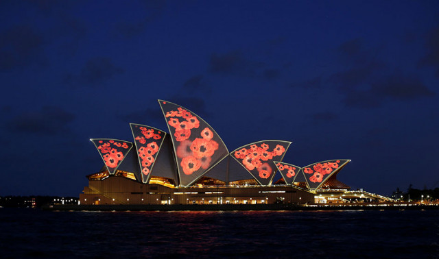 the sails of the the sydney opera house are lit with poppies commemorating the armistice ending world war one on remembrance day in sydney australia photo reuters