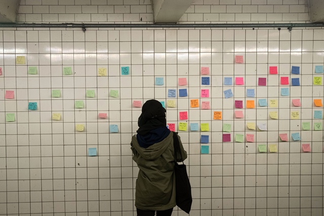 artist matthew chavez who goes by 039 levee 039 created the 039 subway therapy 039 wall to offer new yorkers a chance to write down their feelings in the wake of the presidential election photo afp