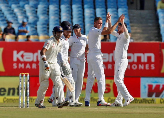 england players wore the red flower symbol on the right collar of their shirts and held a minute 039 s silence before play in the second test against india photo reuters