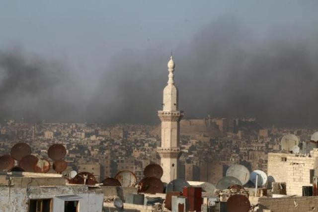 a general view shows rising smoke from burning tyres photo reuters a general view shows rising smoke from burning tyres photo reuters