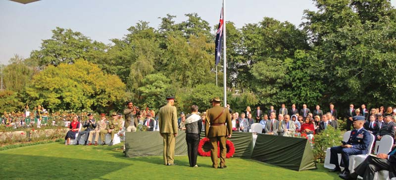 flag hoisting ceremony is being held at the australian high commission during the annual remembrance day service photo pr