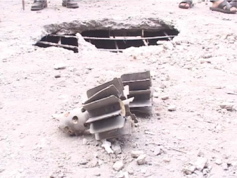 a mortar shell that hit a residential house in the nakyal sector lays on the ground photo m a mir express a mortar shell that hit a residential house in the nakyal sector lays on the ground photo m a mir express