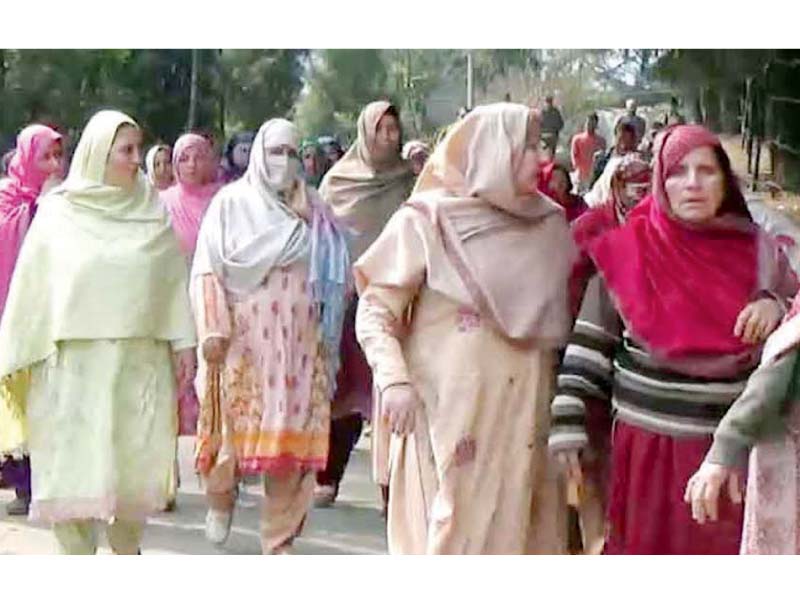 women march in athmuqam photo express