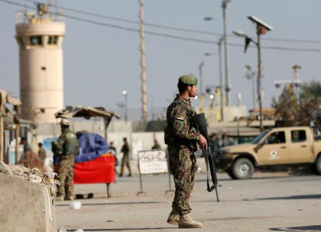 afghan national army ana soldiers keep watch outside the bagram airfield entrance gate after an explosion at the nato air base north of kabul afghanistan november 12 2016 photo reuters afghan national army ana soldiers keep watch outside the bagram airfield entrance gate after an explosion at the nato air base north of kabul afghanistan november 12 2016 photo reuters