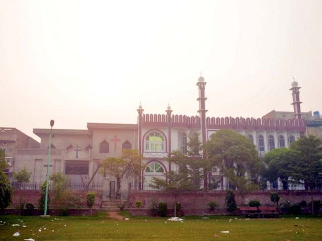 the mosque and church which are next to each other in the nazimabad colony of faisalabad photo express the mosque and church which are next to each other in the nazimabad colony of faisalabad photo express