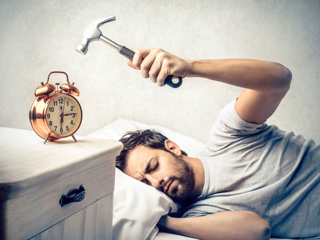 sleeping after hitting the snooze button can actually make you tired