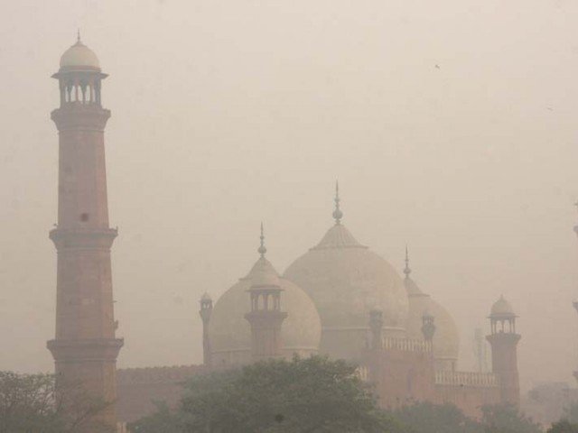 smog hangs in the air around badshahi mosque in lahore photo abid nawaz express