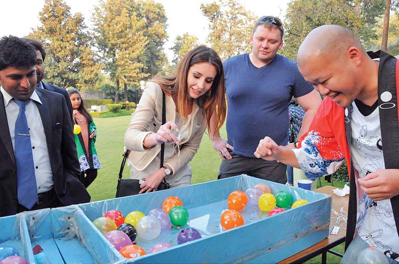 people take part in various activities during bon odori event held at the japanese embassy photos arslan altaf express amp agencies