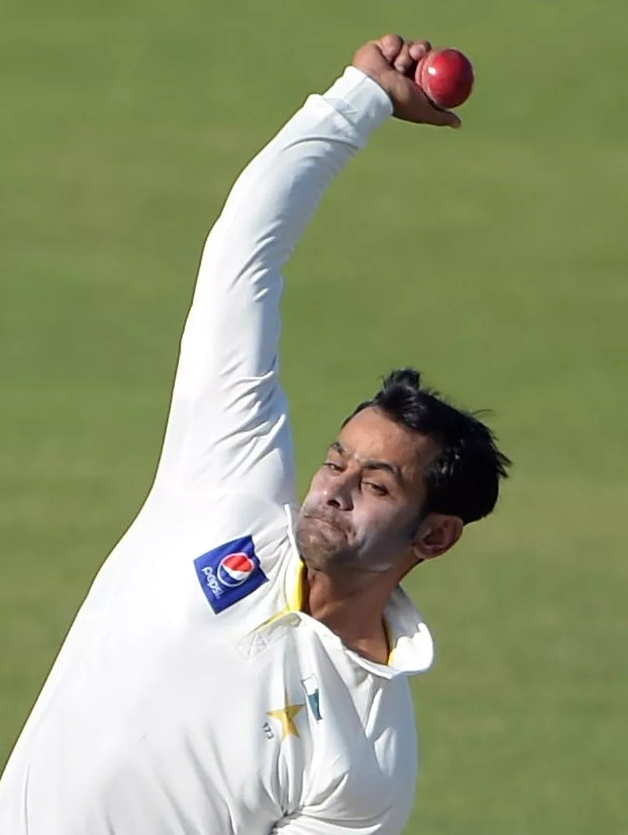 pakistani spinner mohammad hafeez delivers the ball during the second day of the third and final test match between new zealand and pakistan at the sharjah cricket stadium in sharjah on november 28 2014 new zealand were 164 1 at tea on the second day of the third and final test against pakistan mccullum was on a quickfire 100 and with him kane williamson on 44 as new zealand now trail pakistan 039 s first innings total of 351 by 187 runs afp photo aamir qureshi photo credit should read aamir qureshi afp getty images pakistani spinner mohammad hafeez delivers the ball during the second day of the third and final test match between new zealand and pakistan at the sharjah cricket stadium in sharjah on november 28 2014 new zealand were 164 1 at tea on the second day of the third and final test against pakistan mccullum was on a quickfire 100 and with him kane williamson on 44 as new zealand now trail pakistan 039 s first innings total of 351 by 187 runs afp photo aamir qureshi photo credit should read aamir qureshi afp getty images