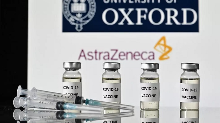 this file illustration photo taken on november 17 2020 shows vials with covid 19 vaccine stickers attached and syringes with the logo of the university of oxford and its partner british pharmaceutical company astrazeneca anglo swedish pharmaceutical giant astrazeneca january 30 2021 has become a headache with questions about its effectiveness and potential litigation because of delays in delivery to the european union photo afp