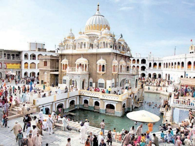 sikh devotees throng the temple in hassanabdal photo file sikh devotees throng the temple in hassanabdal photo file