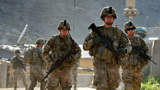 us army soldiers march from the forward base honaker miracle at watahpur district in kunar province photo afp