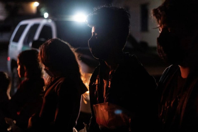unaccompanied minor migrants from central america wait to be processed by the u s border patrol agents after crossing the rio grande river into the united states from mexico in roma texas u s july 30 2021 photo reuters unaccompanied minor migrants from central america wait to be processed by the u s border patrol agents after crossing the rio grande river into the united states from mexico in roma texas u s july 30 2021 photo reuters
